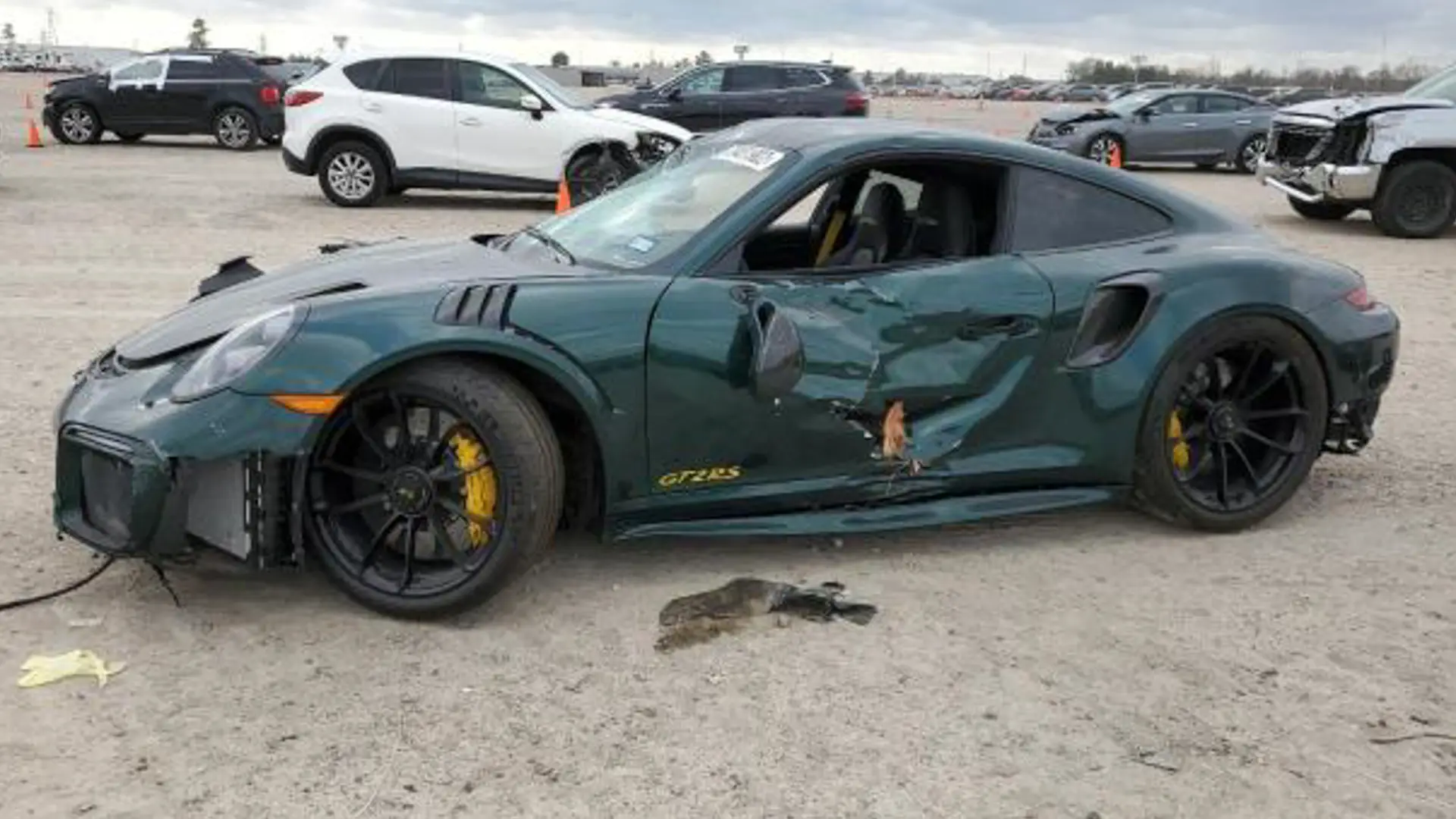 Patrick Reeds Wrecked Masters Porsche 911 Gt2 Rs Appears On Copart